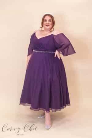 Plus size chiffon occasion dress with sweetheart neckline, crystal straps, and full skirt in purple