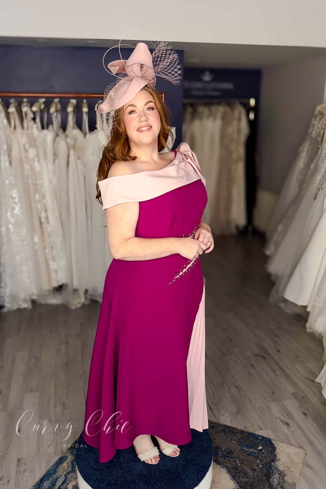 Veni Infantino berry and blush plus size formal occasion dress with flowing pleated panel, Curvy Chic Boutique Belfast
