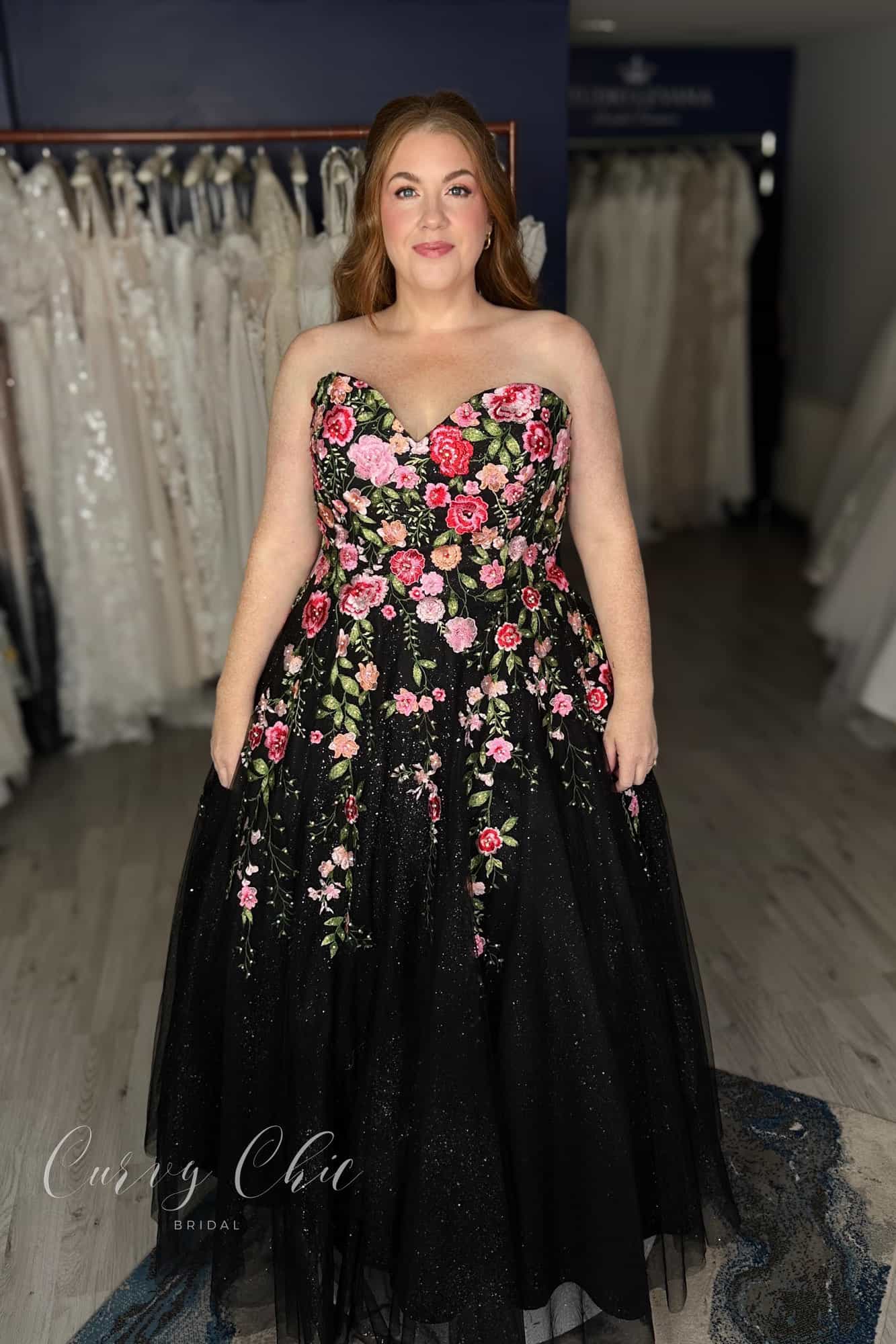 Plus size bride in black floral ball gown with sparkle tulle