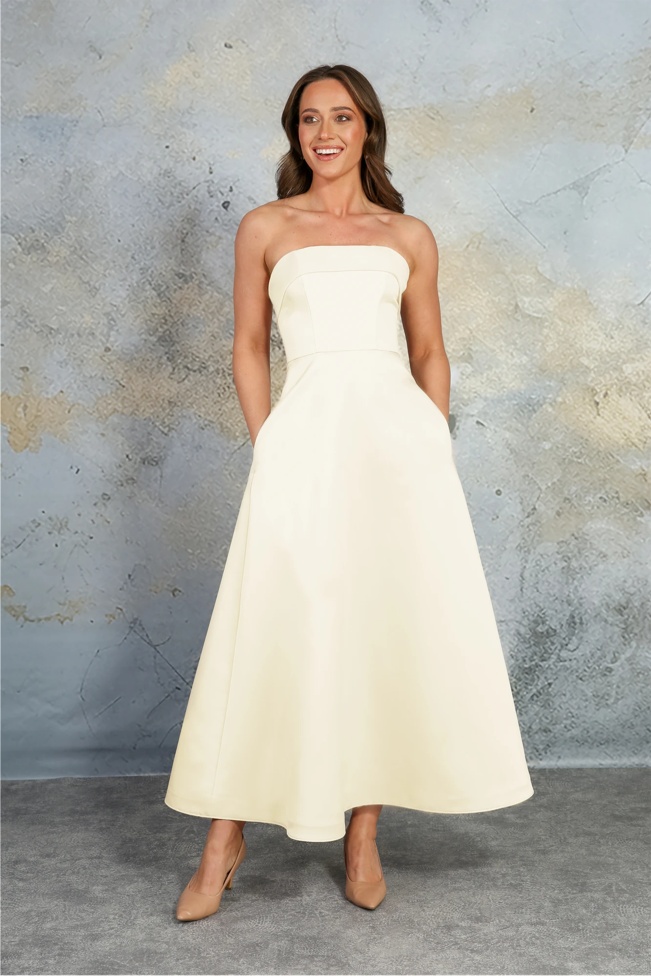 Plus size bride wearing strapless satin A-line wedding dress by Richard Designs RDM1355 IVORY